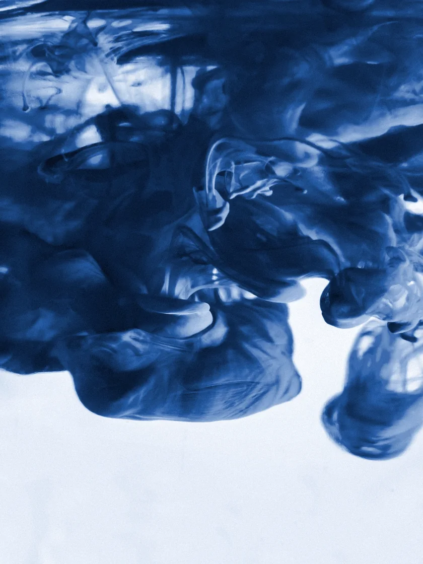 Blue ink blooming in water