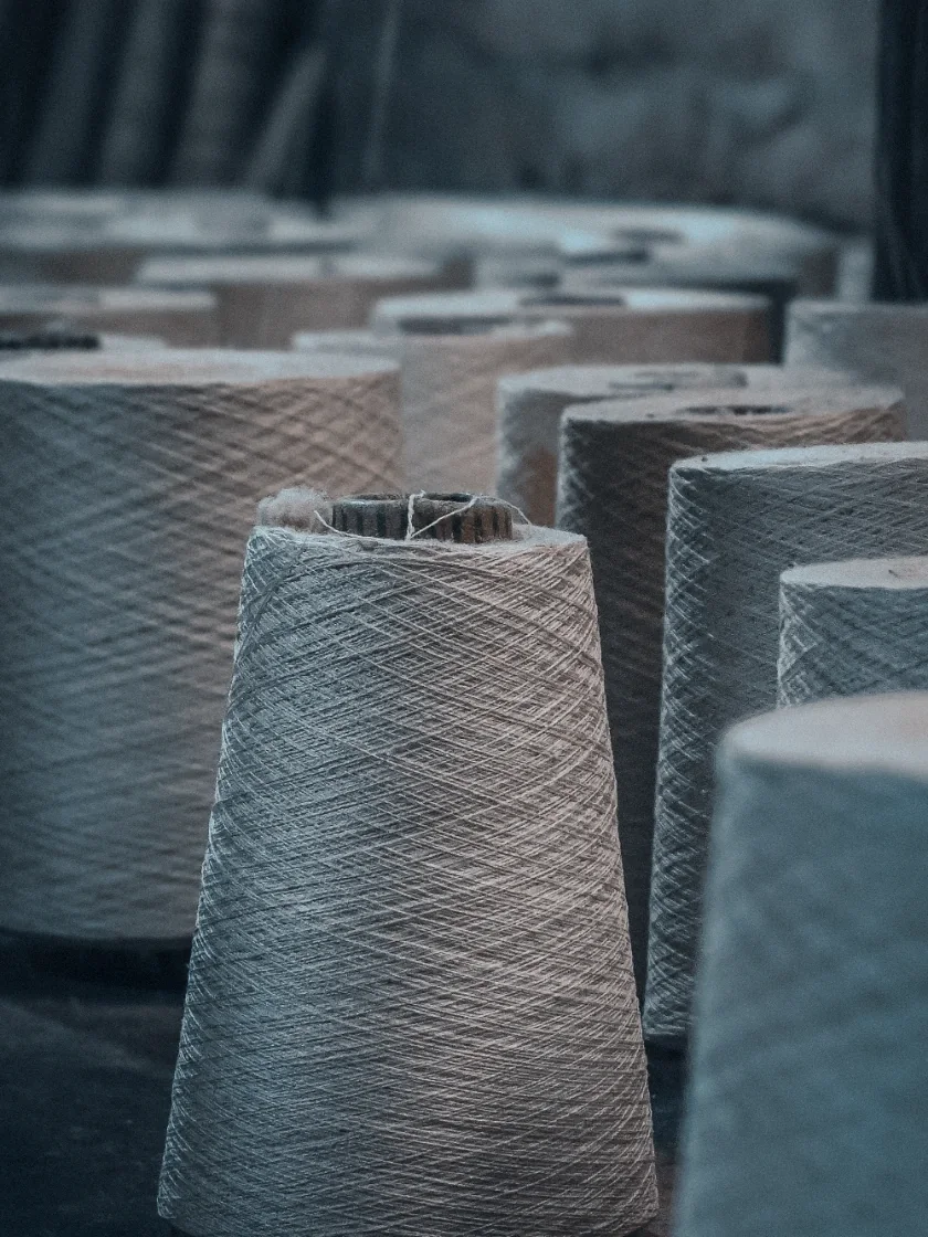 Cones of yarn in a spinning mill